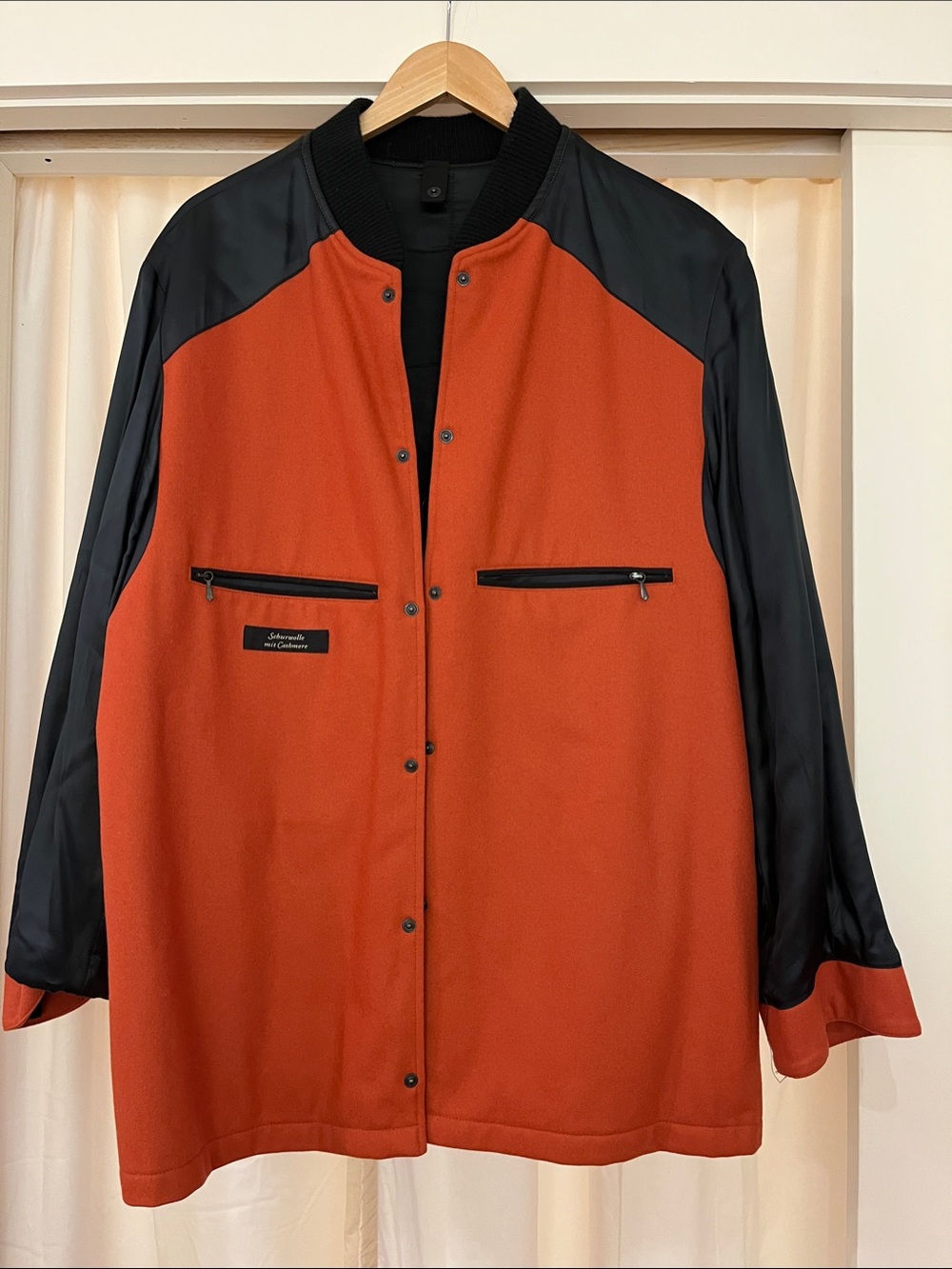 Schneider Rust Orange and Black Bomber-Style Varsity Jacket